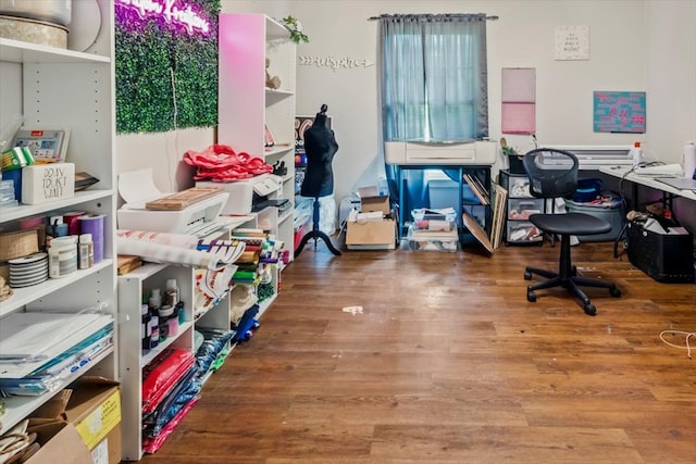 home office with wood-type flooring