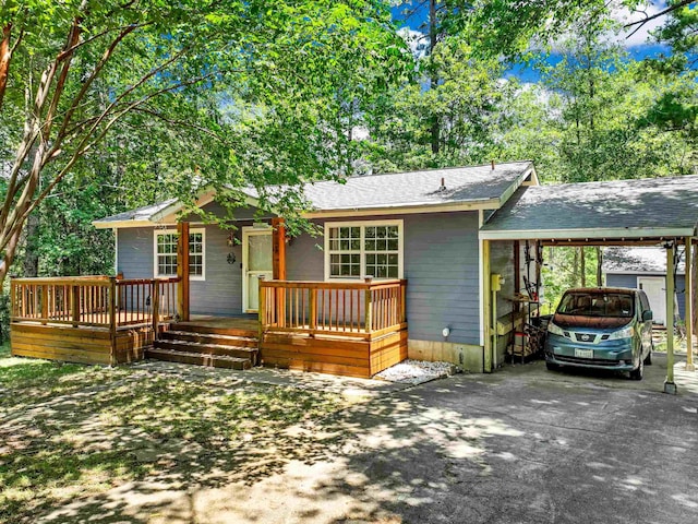 ranch-style home with a carport