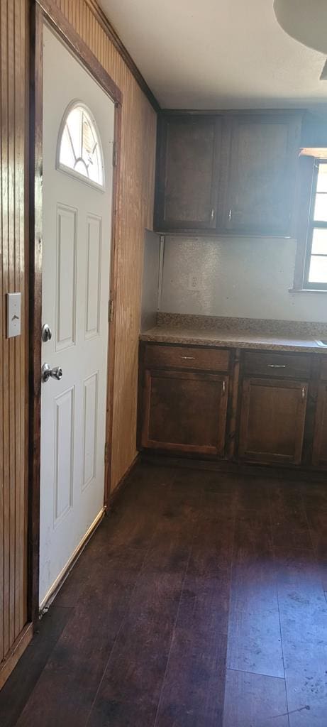 entryway featuring dark wood-style floors