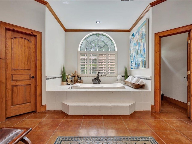 2102 Brentwood Dr, Lufkin, TX 75901 - bathroom featuring crown molding, a garden tub, and tile patterned flooring
