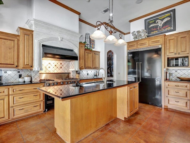 2102 Brentwood Dr, Lufkin, TX 75901 - kitchen with high end appliances, backsplash, dark countertops, crown molding, and tile patterned flooring