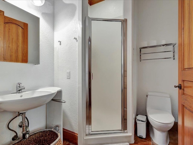 2102 Brentwood Dr, Lufkin, TX 75901 - full bathroom with a stall shower and toilet