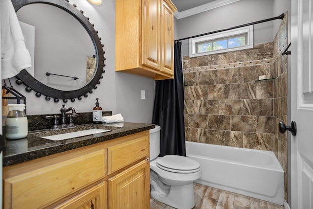 2607 Old Union Rd, Lufkin, TX 75904 - bathroom featuring ornamental molding, vanity, toilet, shower / bath combo with shower curtain, and wood finished floors