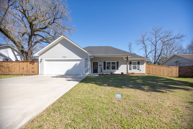 ranch-style house featuring a garage, fence, a front lawn, and concrete driveway