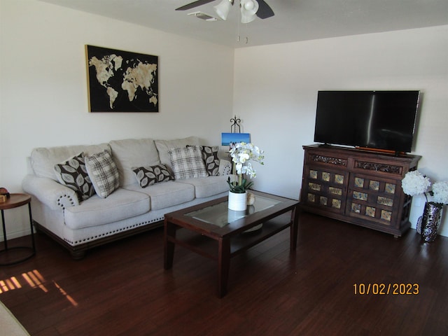 living room with wood-type flooring and ceiling fan