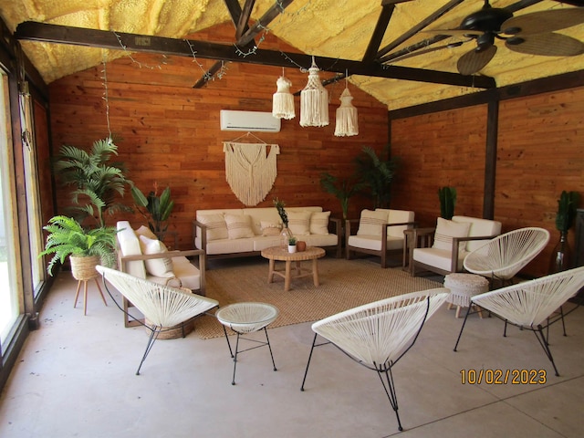 sunroom / solarium featuring vaulted ceiling, an AC wall unit, and ceiling fan