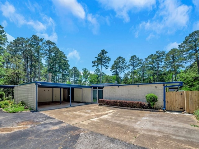 exterior space with a carport