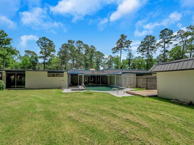 back of house featuring a lawn