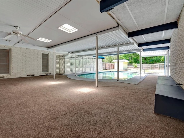 view of swimming pool with ceiling fan