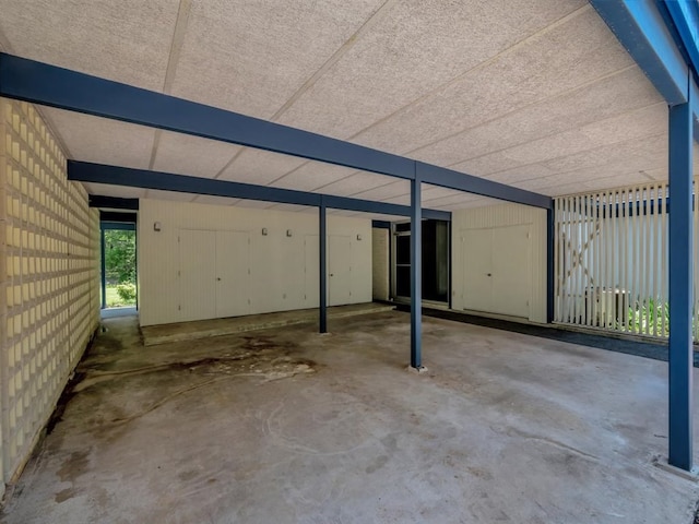 view of patio / terrace featuring a carport