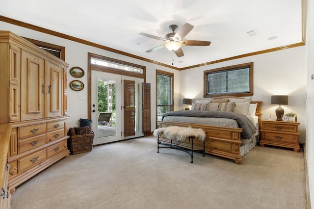 carpeted bedroom featuring access to exterior, ceiling fan, and ornamental molding