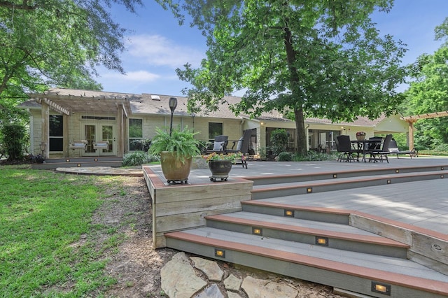 back of property with a pergola