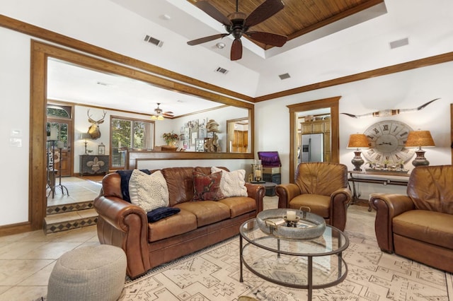 tiled living room featuring ceiling fan