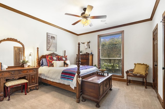 bedroom featuring ceiling fan, crown molding, and light carpet