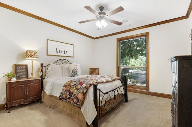 bedroom with ceiling fan, crown molding, and light colored carpet