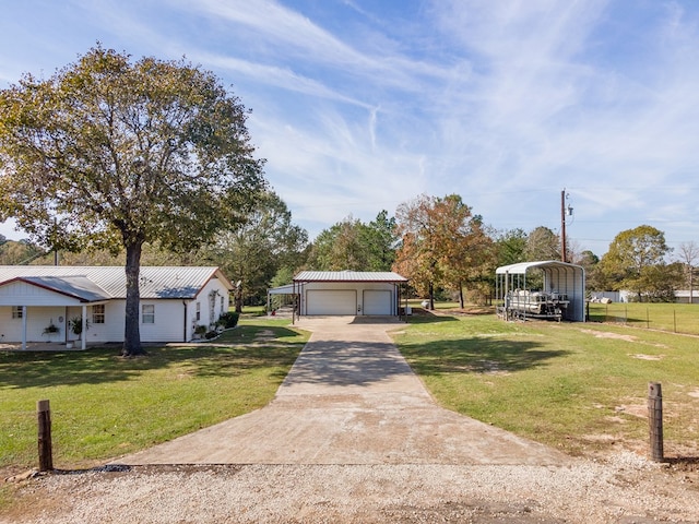 view of front of property featuring a front lawn and a carport