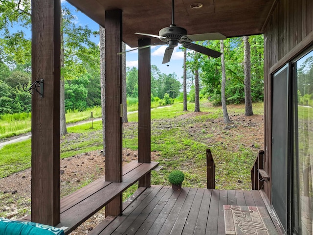 exterior space featuring ceiling fan