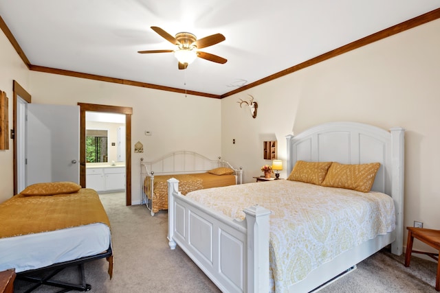 bedroom with crown molding, connected bathroom, a ceiling fan, and light colored carpet