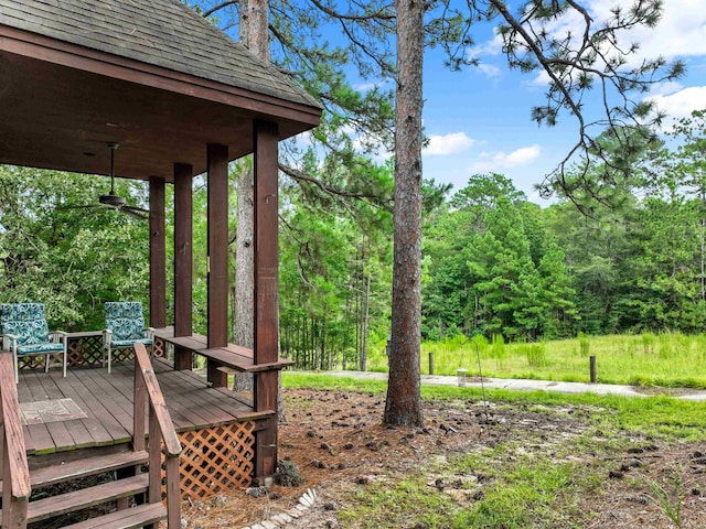 view of yard featuring a wooden deck