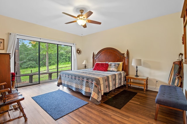 bedroom featuring wood finished floors, a ceiling fan, and access to exterior