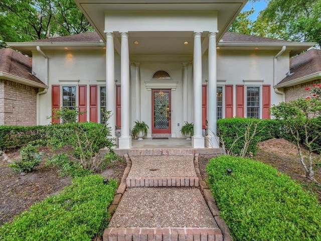 entrance to property with covered porch