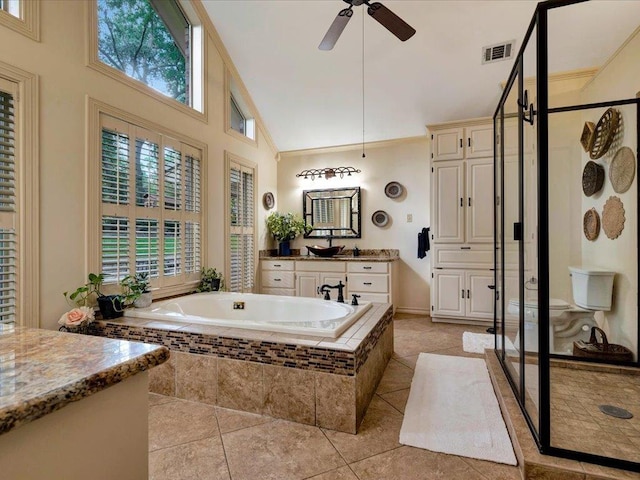 bathroom with vanity, high vaulted ceiling, tile patterned flooring, ceiling fan, and separate shower and tub