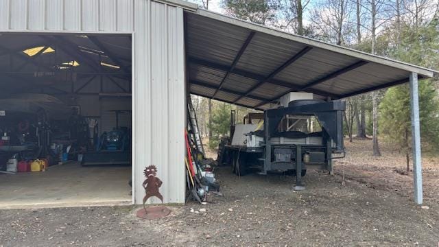 672 Oakhill Rd, Hemphill, TX 75948 - view of parking with a garage