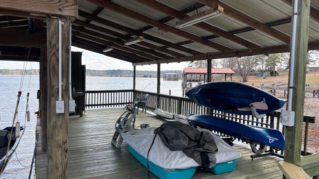 dock area featuring a water view