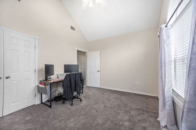 office featuring high vaulted ceiling, visible vents, plenty of natural light, and carpet