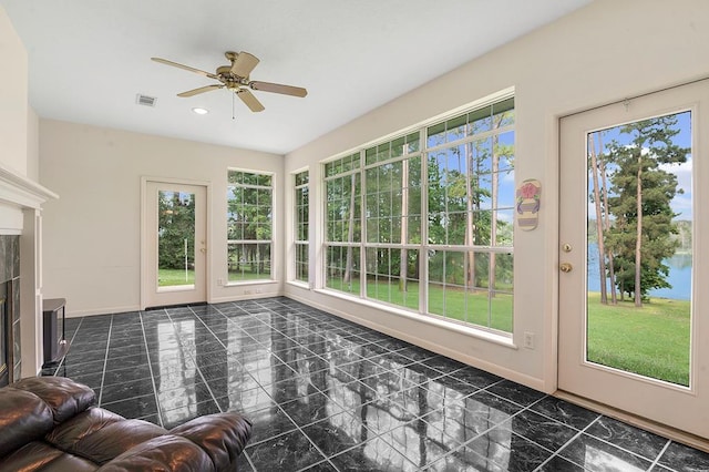 627 Shoreline Dr, Brookeland, TX 75931 - sunroom featuring recessed lighting and baseboards