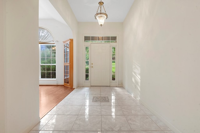 627 Shoreline Dr, Brookeland, TX 75931 - entryway with plenty of natural light, baseboards, and light tile patterned floors