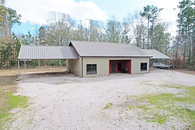 exterior space featuring a carport