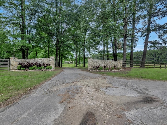 3274 Cc Rd, Diboll, TX 75941 - view of street with a gate