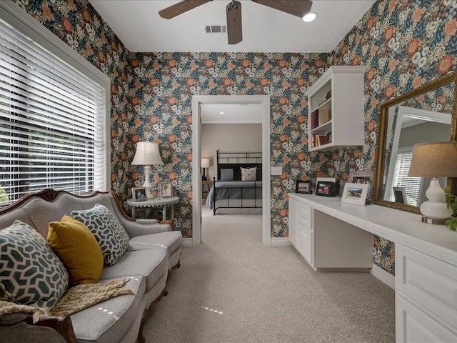 3274 Cc Rd, Diboll, TX 75941 - living area with a ceiling fan, baseboards, wallpapered walls, and light carpet