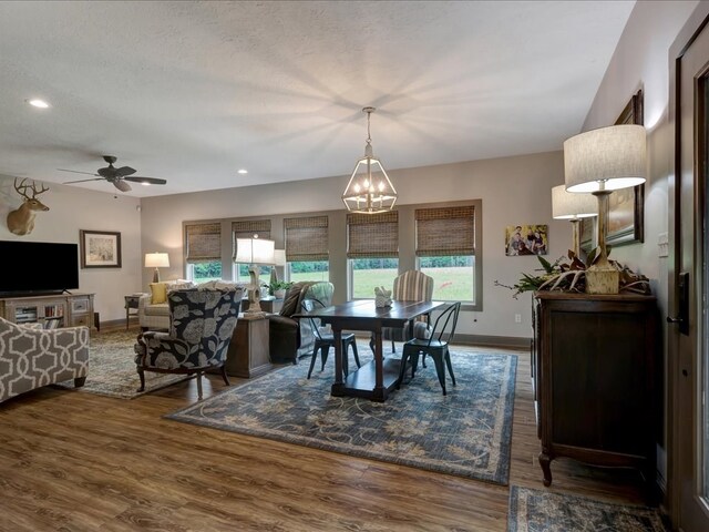 3274 Cc Rd, Diboll, TX 75941 - dining area featuring a chandelier, wood finished floors, baseboards, recessed lighting, and ceiling fan