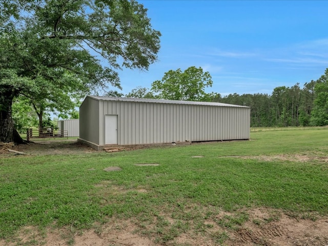 3274 Cc Rd, Diboll, TX 75941 - view of green lawn featuring an outdoor structure and an outbuilding