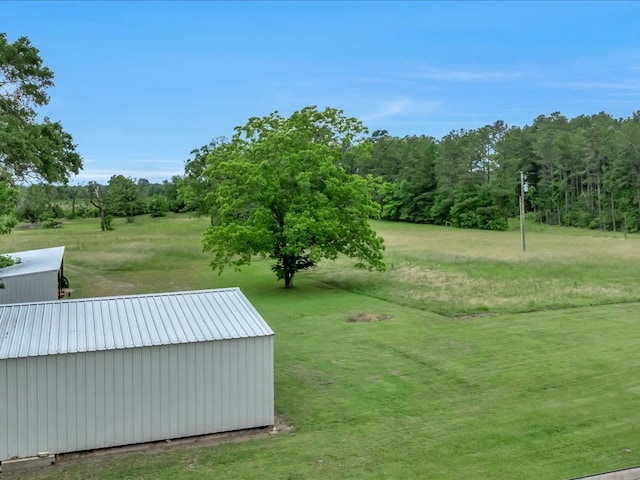 3274 Cc Rd, Diboll, TX 75941 - view of green lawn with an outdoor structure and an outbuilding