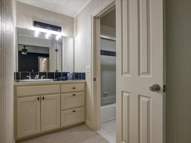 3274 Cc Rd, Diboll, TX 75941 - full bathroom featuring crown molding, vanity, bath / shower combo with glass door, and tile patterned floors