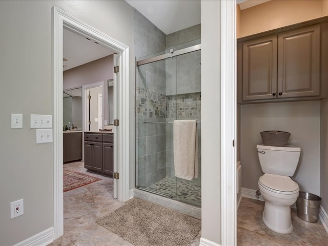 3274 Cc Rd, Diboll, TX 75941 - bathroom with a stall shower, vanity, baseboards, and toilet
