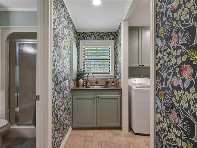 3274 Cc Rd, Diboll, TX 75941 - bathroom featuring washer / clothes dryer, wallpapered walls, a stall shower, vanity, and ornamental molding