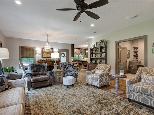 3274 Cc Rd, Diboll, TX 75941 - living area with wood finished floors, ceiling fan, and recessed lighting