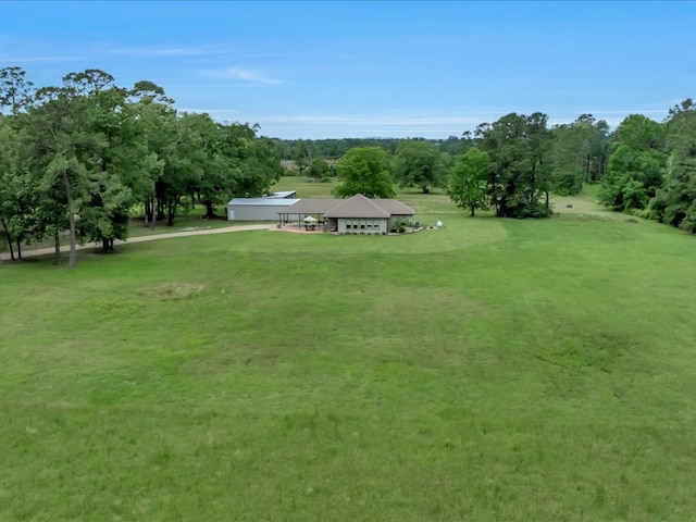 3274 Cc Rd, Diboll, TX 75941 - view of home's community with a yard