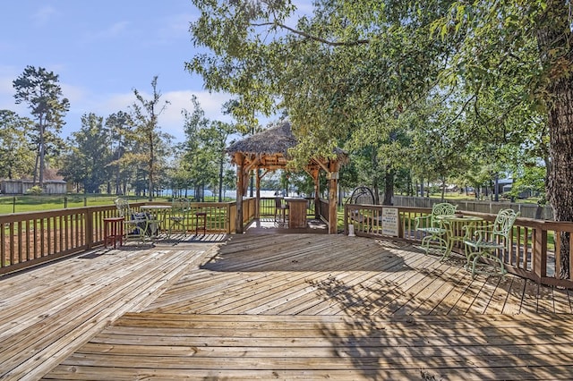 wooden deck with a gazebo