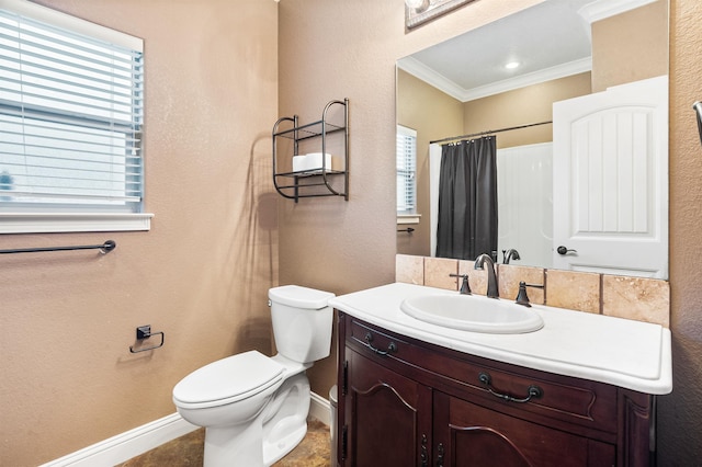 bathroom with a shower with curtain, vanity, ornamental molding, and toilet