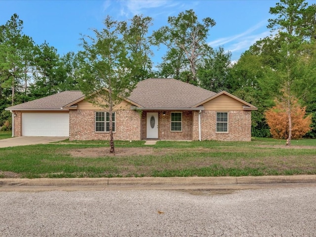 ranch-style home with a garage and a front lawn