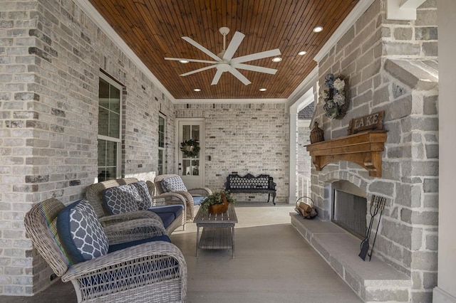 view of patio with an outdoor living space and ceiling fan