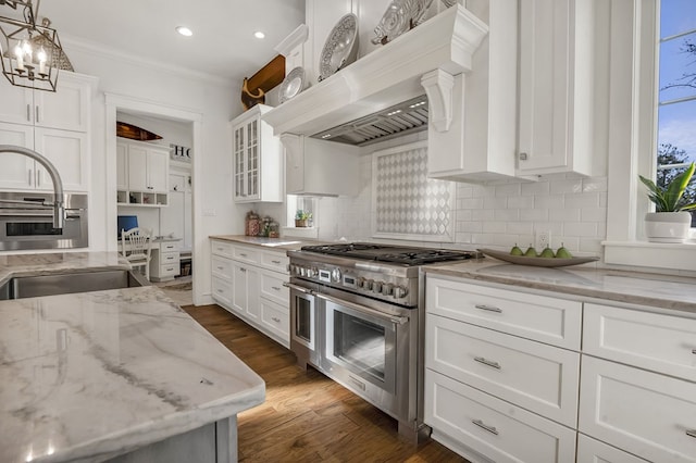 kitchen featuring white cabinets, dark wood-style flooring, and stainless steel appliances