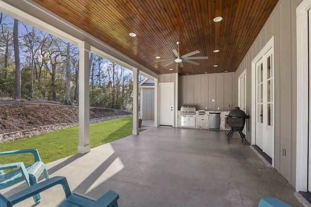 view of patio / terrace featuring grilling area, exterior kitchen, and ceiling fan