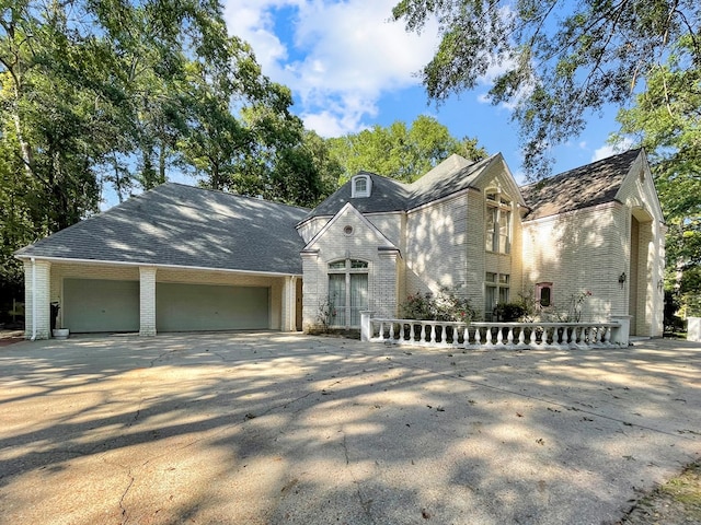 view of front of property with a garage