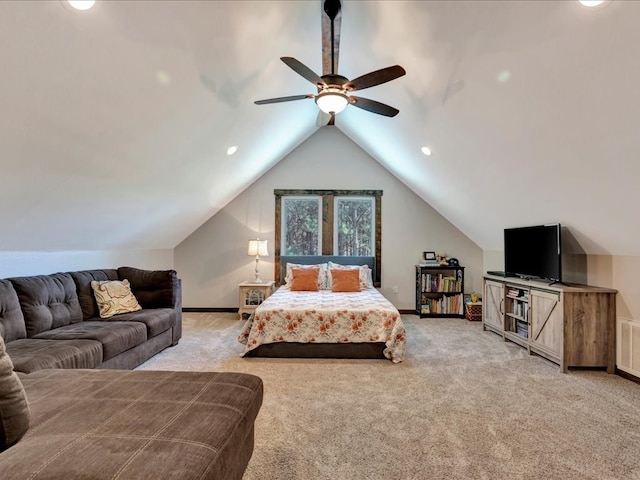 bedroom featuring baseboards, ceiling fan, vaulted ceiling, and light carpet